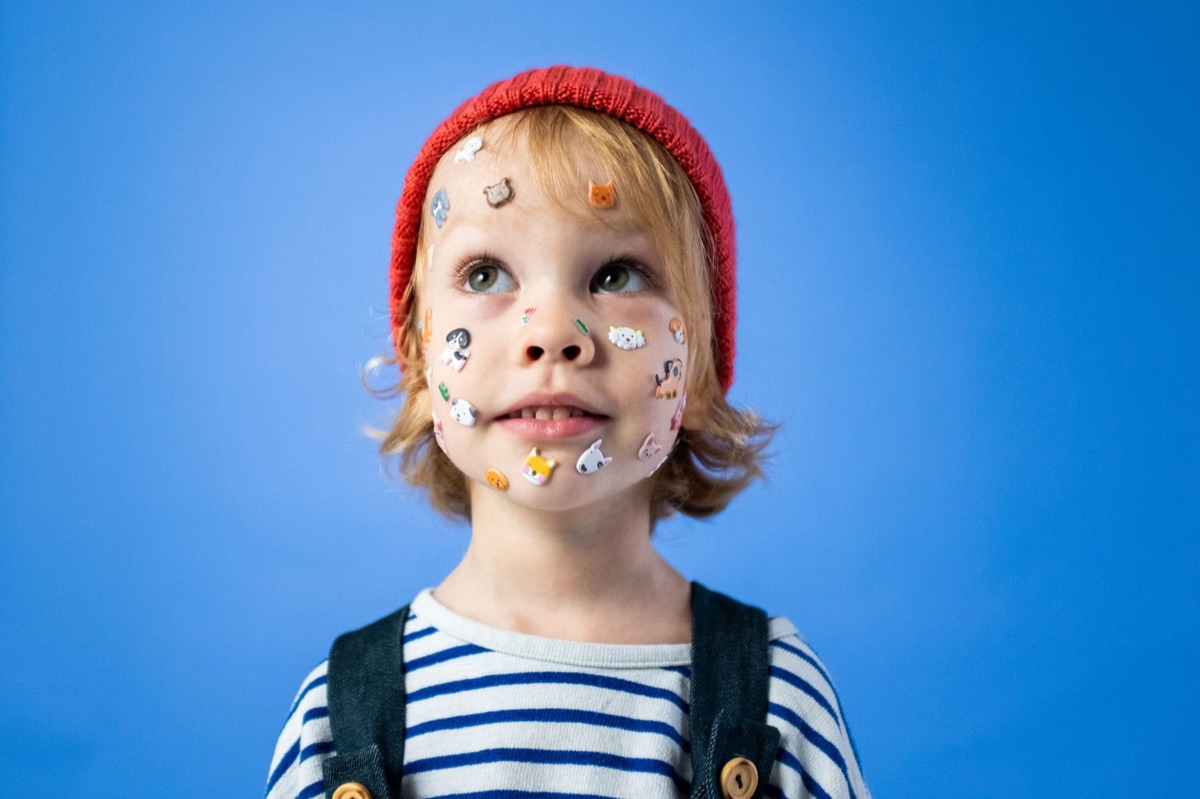 Italian child with vaccination sticker