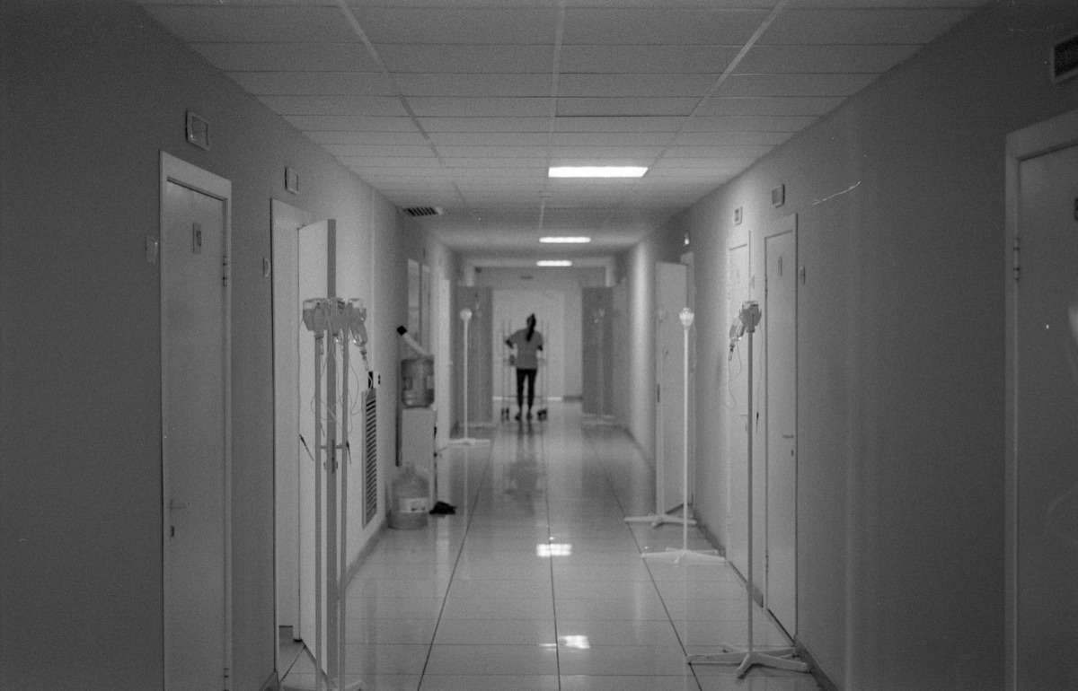 Rome hospital corridor with emergency signs