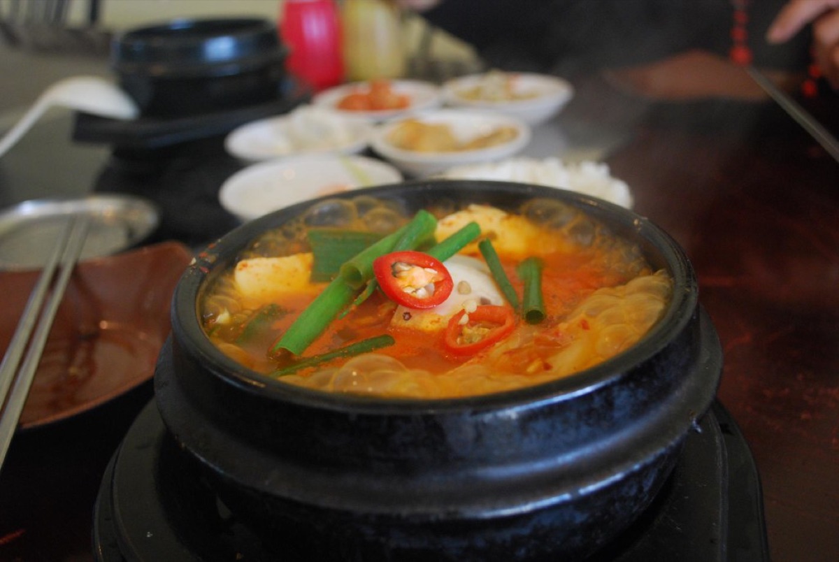 Traditional kimchi stew dish on white plate