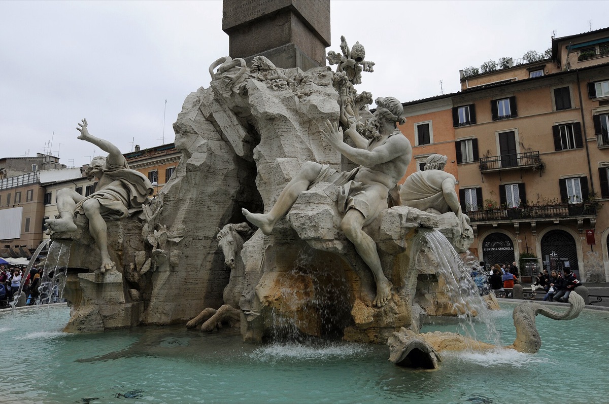 People discussing in piazza, social debate, cultural conflict